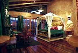 Standard Room: 650 square feet with a king-size canopy bed facing a grand gas fireplace, Peace Lodge, Costa Rica