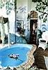The outrageous, free-form rainforest bathroom in the Rosa Blanca Master suite is filled with plants, painted with jungle designs, and the royal blue bath is big enough for two and filled by a waterfall running through rocks, Rosa Blanca Hotel, Santa Barbara de Heredia, Costa Rica